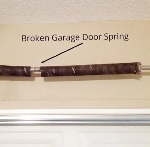 Old broken rusty garage door spring how to repair